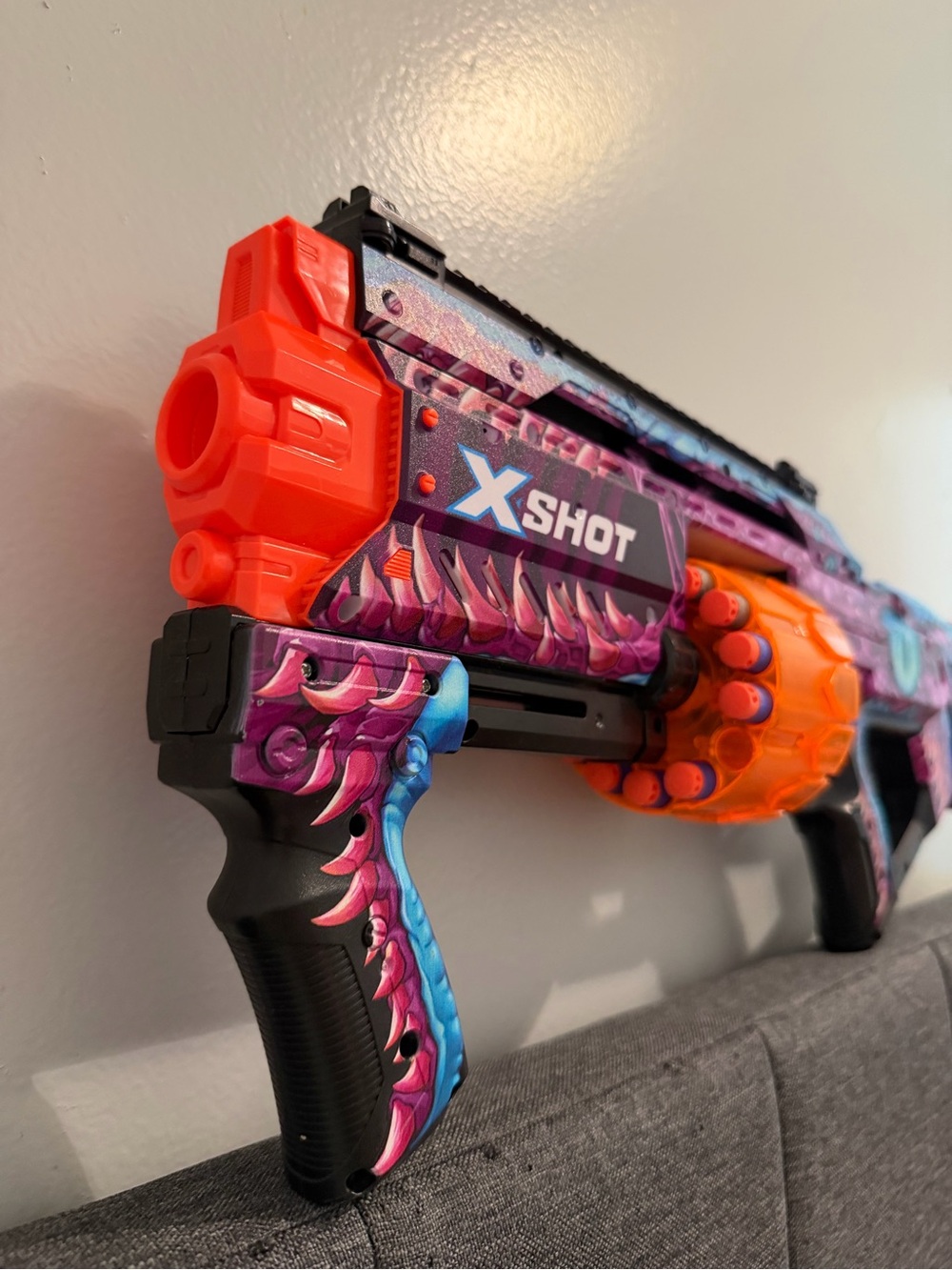 X-Shot Skins Last Stand Foam Dart Blaster in the "Enigma" design by ZURU